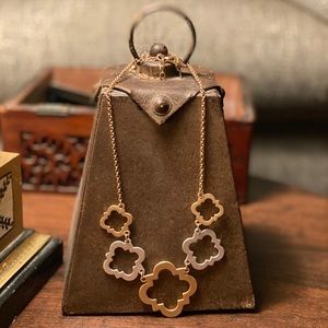 Quatrefoil gold finish necklace